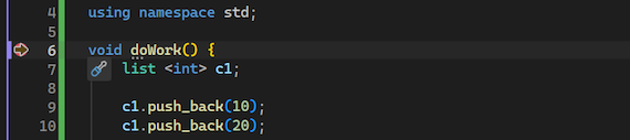 Captura de pantalla que muestra el depurador detenido en un punto de interrupción definido en Visual Studio.